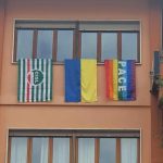 La bandiera ucraina e la bandiera della pace esposte sulla facciata della sede provinciale della Cisl di Lecce e delle sedi zonali del Salento